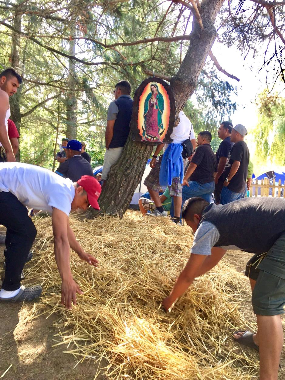 Workers setting up altar